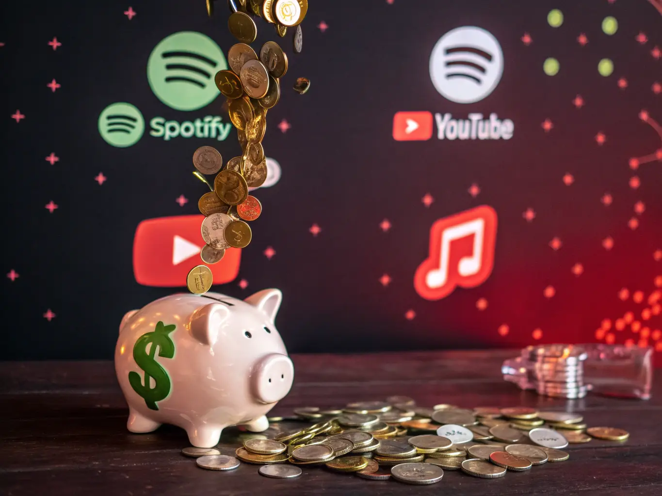 An image of a broken piggy bank with dollar bills, symbolizing recovery from financial loss due to investment fraud.